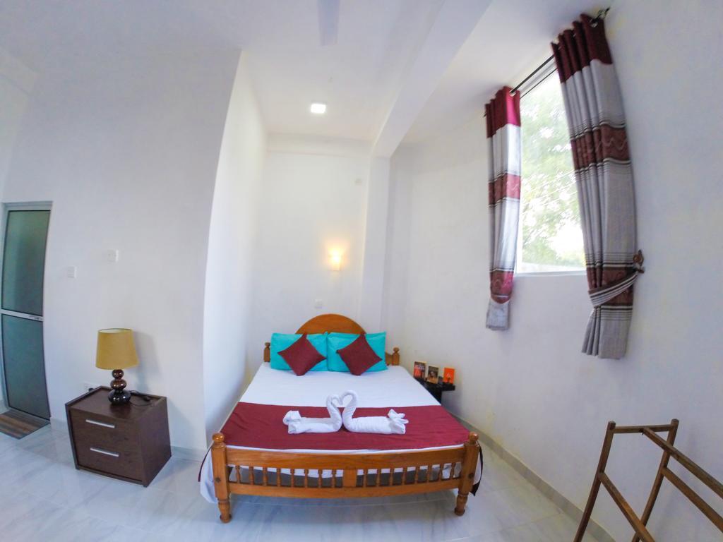 פולונרואה Sanctuary Cove Guest House חדר תמונה