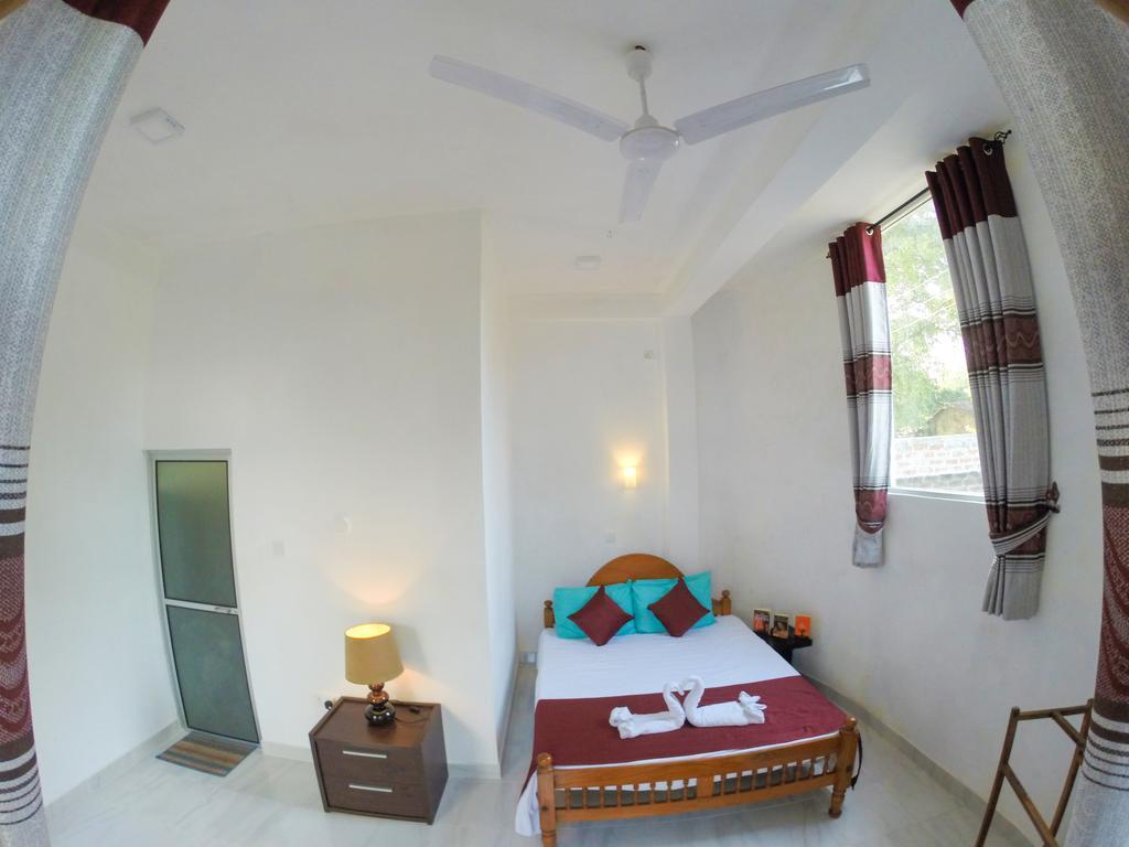 פולונרואה Sanctuary Cove Guest House חדר תמונה