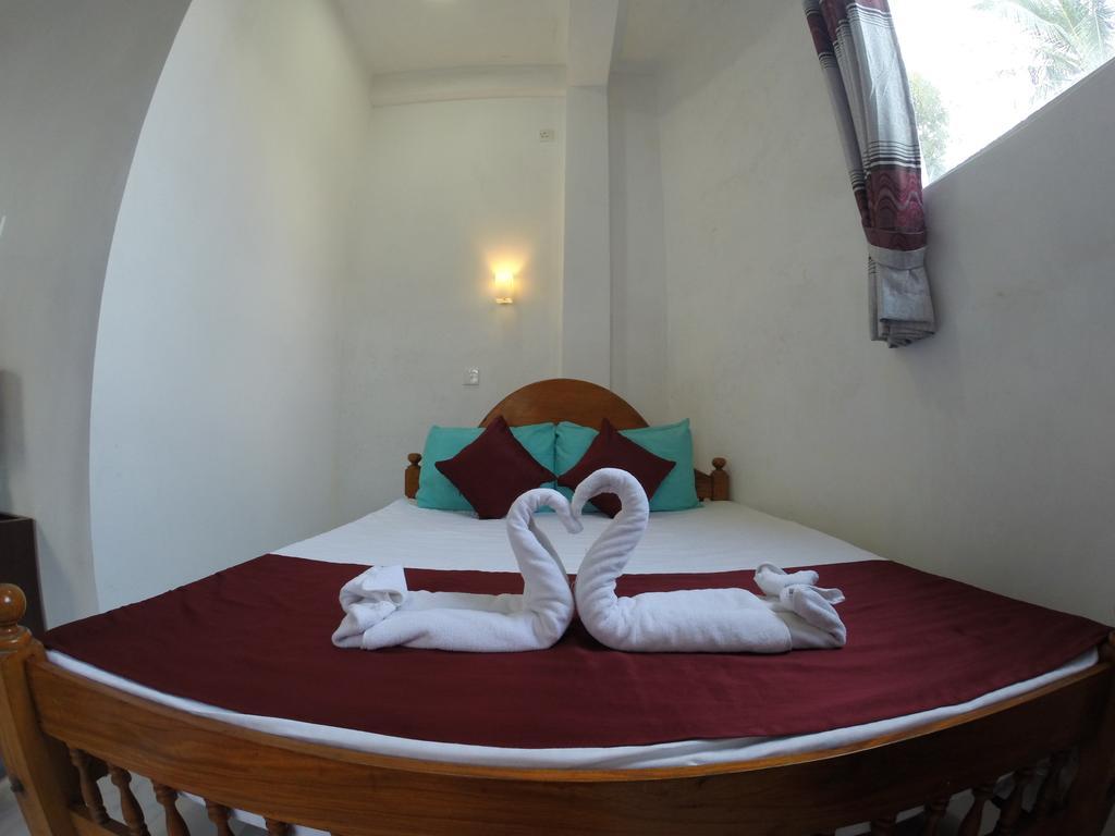 פולונרואה Sanctuary Cove Guest House מראה חיצוני תמונה